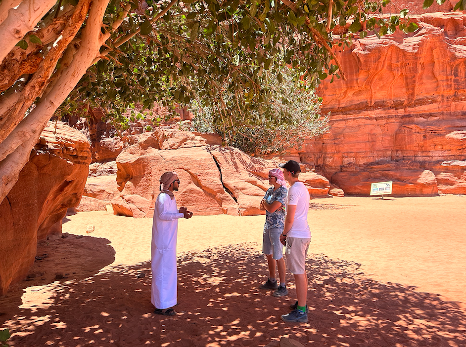 rashed-explaning-the-inscriptions-in-khazali-canyon